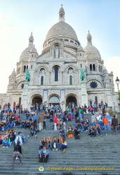 The Sacré-Coeur exterior is built from travertine stone. It gives out calcite on contact with rain, making it white
